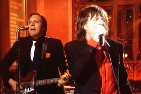 Arcade Fire red patched with Mick Jagger