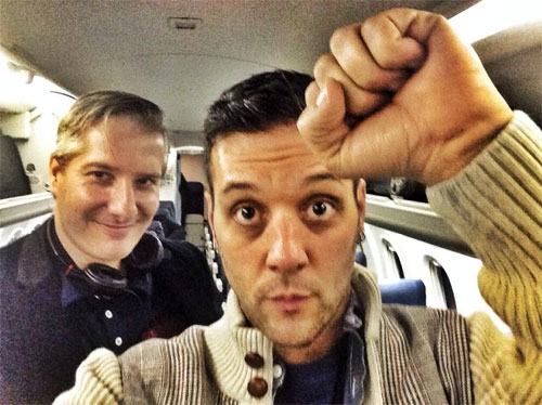 George and Aaron on a plane.