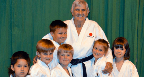 Dot Naylor and young karate participants.